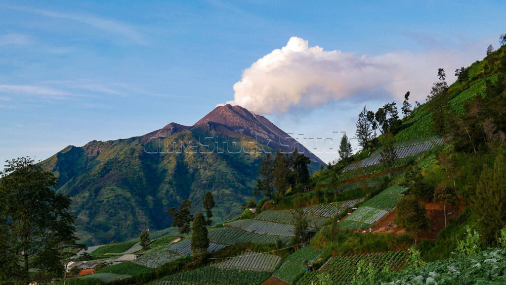 Mount Merapi Landscape with Volcanic Smoke.