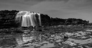 Natural Beauty of Karang Taraje Water Flow Waterfall in Black and White.