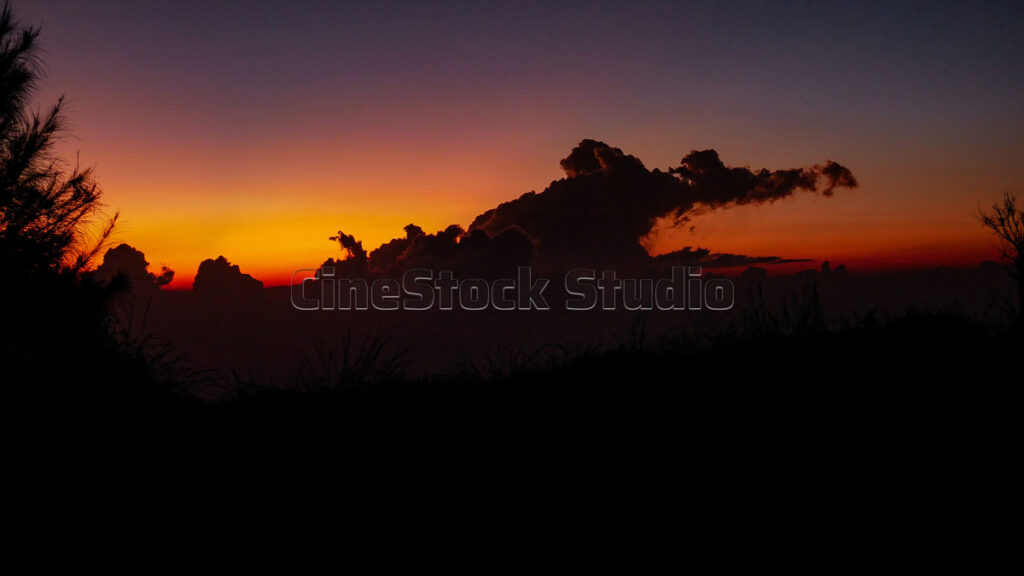 Clouds with unique shapes in the sky at sunset.
