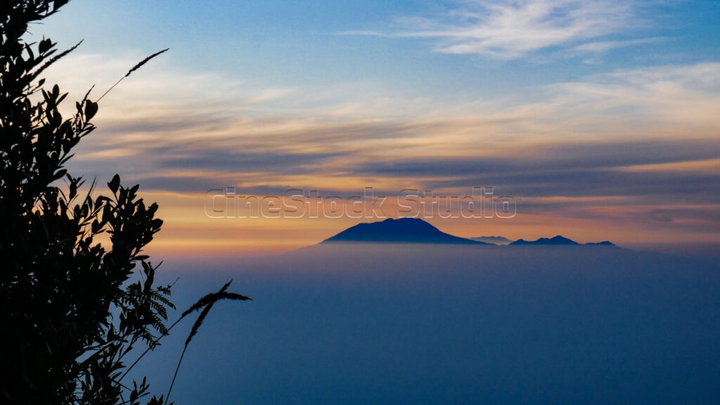 Silhouette of Mountain Lawu in Sea of Mist at Dawn.