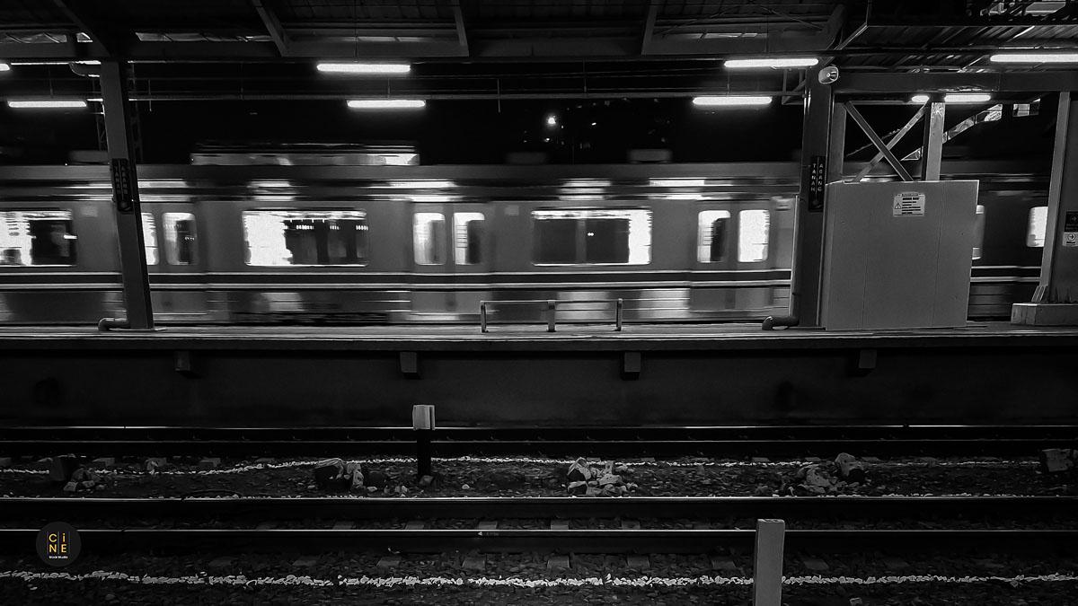 Photo Essay A long exposure of a moving commuter train at Tanah Abang station platform.